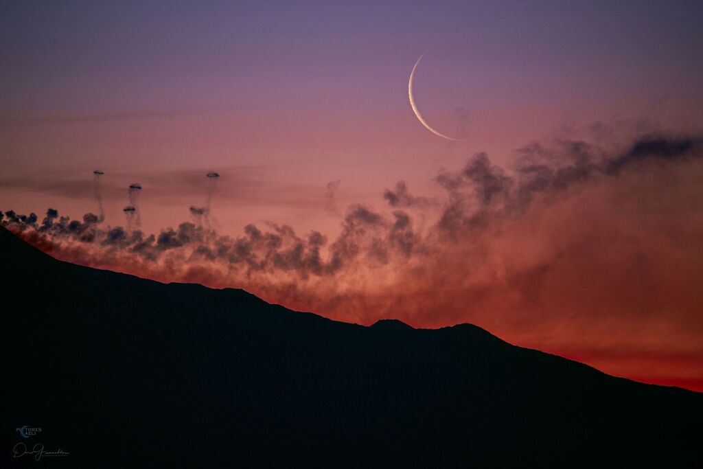 Moon and Smoke Rings from Mt. Etna