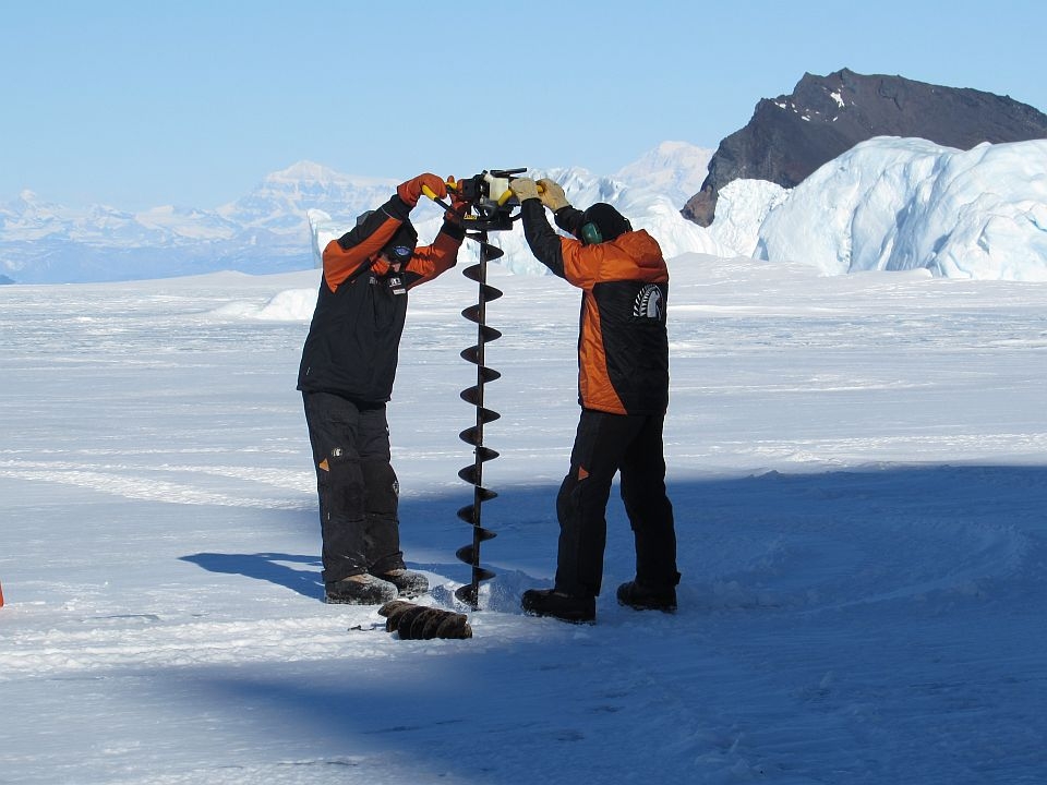 25cm Ice Auger being used on the ice floor