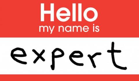 Know it alls - image of a red name tag that says "expert"