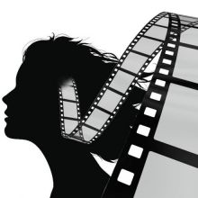 A black silhouette of a woman with movie reels coming out of her head